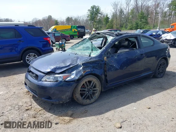 ✅ 2008 Scion tC Spec • VIN: JTKDE167980222943 • Lot: 42143626. Wystawiony na IAAI z przebiegiem 263 762 mil. Bezpłatny archiwum sprzedaży aukcyjnych z USA i szczegółowy raport historii pojazdu na DreamBid. Zdjęcie 2.