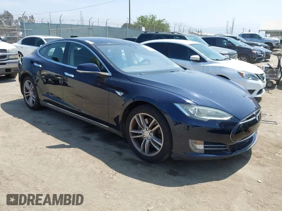 ✅ 2015 Tesla Model S 85 • VIN: 5YJSA1H14FF080616 • Lot: 42478769. Listed on IAAI with 115,428 mi. Free auction sales archive from the USA and detailed vehicle history report at DreamBid. Image 1.