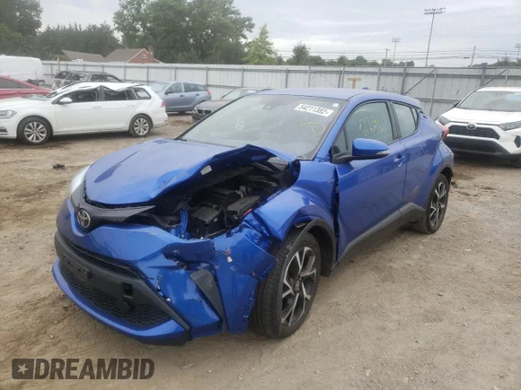 ✅ 2020 Toyota C-HR LE • VIN: NMTKHMBX2LR110101 • Lot: 54211382. Wystawiony na Copart z przebiegiem 27 966 mil. Bezpłatny archiwum sprzedaży aukcyjnych z USA i szczegółowy raport historii pojazdu na DreamBid. Zdjęcie 2.