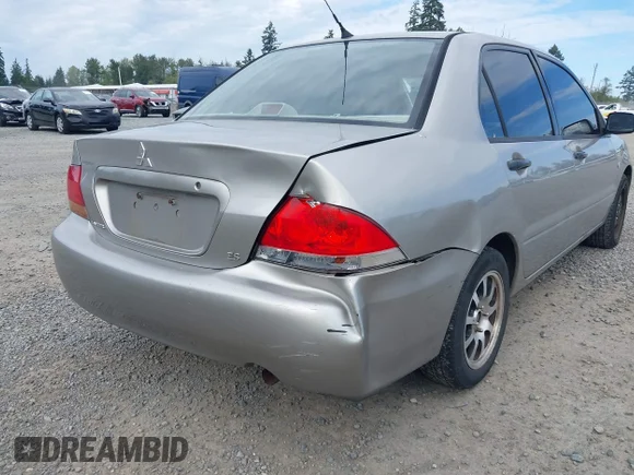 ✅ 2004 Mitsubishi Lancer ES • VIN: JA3AJ26E64U040399 • Lot: 43021343. Wystawiony na IAAI z przebiegiem 197 944 mil. Bezpłatny archiwum sprzedaży aukcyjnych z USA i szczegółowy raport historii pojazdu na DreamBid. Zdjęcie 6.