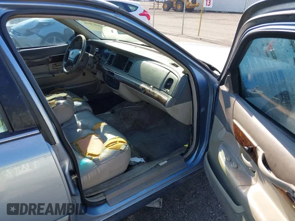 ✅ 1997 Mercury Grand Marquis LS • VIN: 2MELM75W7VX708034 • Lot: 41878938. Wystawiony na IAAI z przebiegiem 197 818 mil. Bezpłatny archiwum sprzedaży aukcyjnych z USA i szczegółowy raport historii pojazdu na DreamBid. Zdjęcie 5.