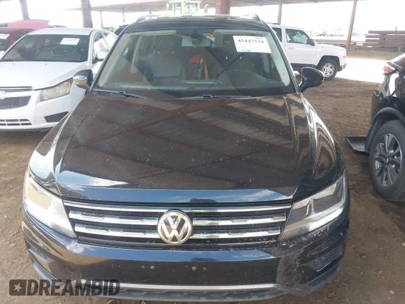 ✅ 2021 Volkswagen Tiguan SE • VIN: 3VV2B7AX8MM048079 • Lot: 45447534. Wystawiony na IAAI z przebiegiem 109 818 mil. Bezpłatny archiwum sprzedaży aukcyjnych z USA i szczegółowy raport historii pojazdu na DreamBid. Zdjęcie 6.