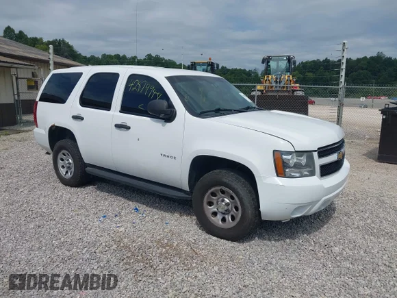 ✅ 2013 Chevrolet Tahoe Commercial • VIN: 1GNSK4E0XDR266234 • Lot: 42879948. Listed on IAAI with 323,662 mi. Free auction sales archive from the USA and detailed vehicle history report at DreamBid. Image 1.