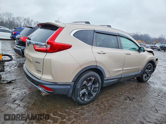 ✅ 2017 Honda CR-V Touring • VIN: 5J6RW2H94HL018879 • Lot: 79453235. Wystawiony na Copart z przebiegiem 97 707 mil. Bezpłatny archiwum sprzedaży aukcyjnych z USA i szczegółowy raport historii pojazdu na DreamBid. Zdjęcie 3.