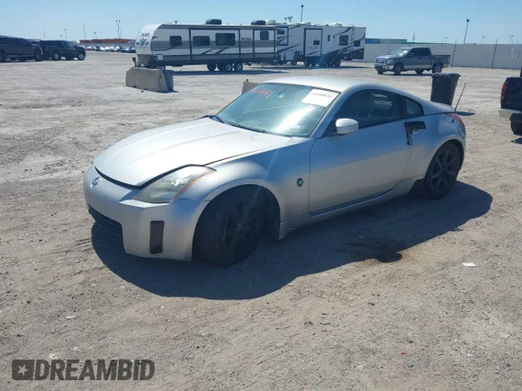 ✅ 2004 Nissan 350Z Touring • VIN: JN1AZ34E34M150011 • Lot: 44668641. Wystawiony na IAAI z przebiegiem 226 158 mil. Bezpłatny archiwum sprzedaży aukcyjnych z USA i szczegółowy raport historii pojazdu na DreamBid. Zdjęcie 2.