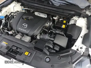 ✅ 2025 Mazda CX-5 S Select • VIN: JM3KFBBL4S0577649 • Лот: 90085075. Опубликован ранее на Copart с пробегом 3 973 миль. Бесплатный доступ к архиву аукционных продаж из США и подробный отчёт об истории автомобиля на DreamBid. Изображение 13.