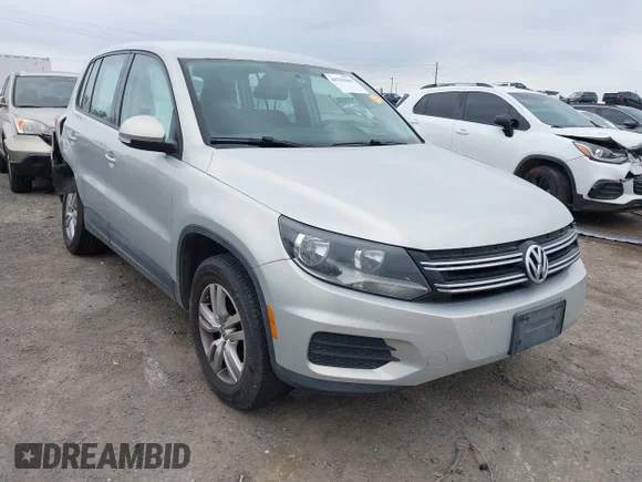 ✅ 2014 Volkswagen Tiguan S • VIN: WVGAV3AX9EW522080 • Lot: 44765664. Wystawiony na IAAI z przebiegiem 166 785 mil. Bezpłatny archiwum sprzedaży aukcyjnych z USA i szczegółowy raport historii pojazdu na DreamBid. Zdjęcie 1.