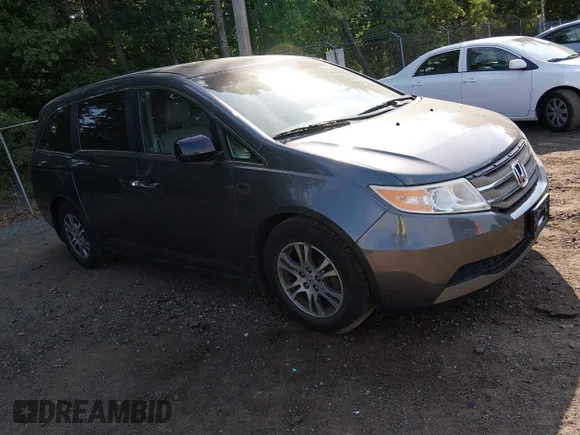 ✅ 2012 Honda Odyssey EX-L • VIN: 5FNRL5H65CB129989 • Lot: 45330439. Listed on IAAI with 156,521 mi. Free auction sales archive from the USA and detailed vehicle history report at DreamBid. Image 1.