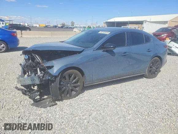 ✅ 2025 Mazda 3 S Carbon Edition • VIN: 3MZBPBCM8SM479392 • Lot: 50132816. Listed on Copart with 6,189 mi. Free auction sales archive from the USA and detailed vehicle history report at DreamBid. Image 1.