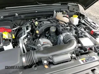 ✅ 2023 Jeep Gladiator Sport S • VIN: 1C6HJTAG1PL527638 • Lot: 84608295. Listed on Copart with 25,164 mi. Free auction sales archive from the USA and detailed vehicle history report at DreamBid. Image 13.