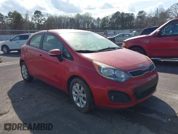 ✅ 2012 Kia Rio SX • VIN: KNADN5A32C6070445 • Лот: 44572405. Опубліковано раніше на IAAI з пробігом 230 682 миль. Безкоштовний доступ до архіву аукціонних продажів зі США та докладний звіт про історію автомобіля на DreamBid. Зображення 1.