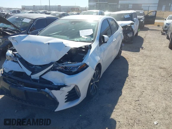 ✅ 2017 Toyota Corolla LE • VIN: 5YFBURHE4HP660173 • Lot: 44331401. Listed on IAAI with 34,009 mi. Free auction sales archive from the USA and detailed vehicle history report at DreamBid. Image 2.