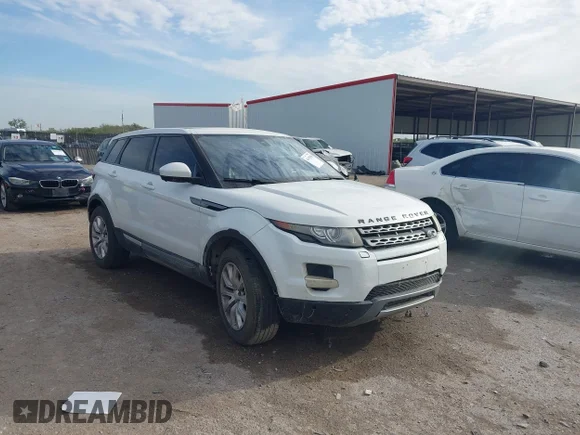 ✅ 2014 Land Rover Range Rover Evoque Pure Premium • VIN: SALVR2BG7EH934840 • Лот: 44679568. Опубліковано раніше на IAAI з пробігом 138 070 миль. Безкоштовний доступ до архіву аукціонних продажів зі США та докладний звіт про історію автомобіля на DreamBid. Зображення 1.