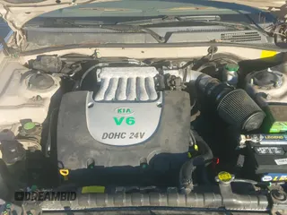 ✅ 2004 Kia Optima LX • VIN: KNAGD128545290401 • Lot: 41564206. Wystawiony na IAAI z przebiegiem 185 108 mil. Bezpłatny archiwum sprzedaży aukcyjnych z USA i szczegółowy raport historii pojazdu na DreamBid. Zdjęcie 12.