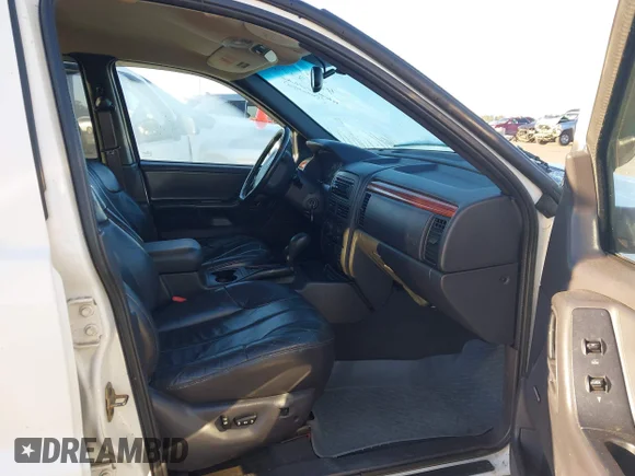 ✅ 1999 Jeep Grand Cherokee Laredo • VIN: 1J4GW58N9XC706431 • Lot: 43443375. Wystawiony na IAAI z przebiegiem 269 160 mil. Bezpłatny archiwum sprzedaży aukcyjnych z USA i szczegółowy raport historii pojazdu na DreamBid. Zdjęcie 5.