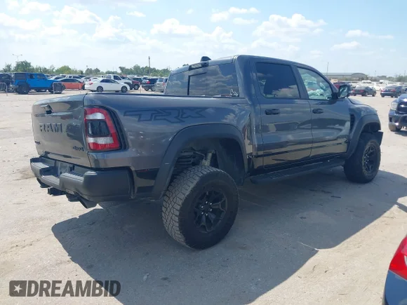 ✅ 2023 Ram 1500 TRX • VIN: 1C6SRFU9XPN501556 • Лот: 43377406. Опубликован ранее на IAAI с пробегом 23 561 миль. Бесплатный доступ к архиву аукционных продаж из США и подробный отчёт об истории автомобиля на DreamBid. Изображение 4.