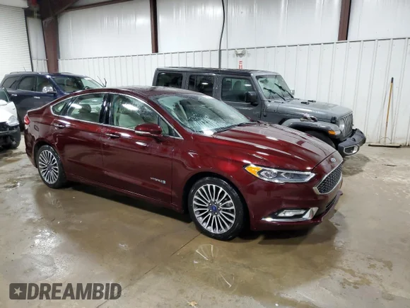 ✅ 2017 Ford Fusion Hybrid Titanium • VIN: 3FA6P0RU3HR261779 • Lot: 45356113. Wystawiony na Copart z przebiegiem 53 890 mil. Bezpłatny archiwum sprzedaży aukcyjnych z USA i szczegółowy raport historii pojazdu na DreamBid. Zdjęcie 4.