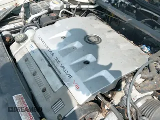 ✅ 2000 Cadillac Eldorado Touring ETC • VIN: 1G6ET129XYU162451 • Lot: 42412406. Listed on IAAI with 89,413 mi. Free auction sales archive from the USA and detailed vehicle history report at DreamBid. Image 12.