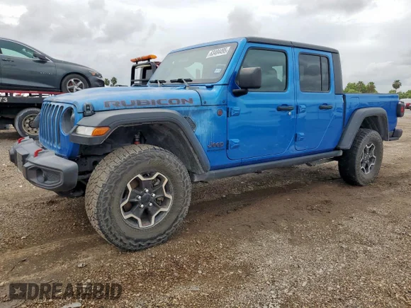 ✅ 2022 Jeep Gladiator Rubicon • VIN: 1C6JJTBG4NL148842 • Лот: 63404495. Опубликован ранее на Copart с пробегом Не указан. Бесплатный доступ к архиву аукционных продаж из США и подробный отчёт об истории автомобиля на DreamBid. Изображение 1.