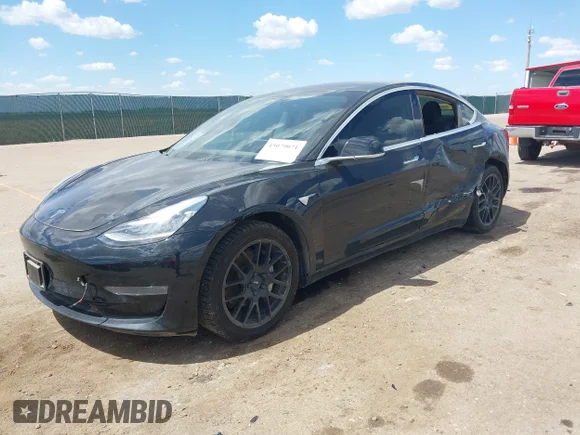 ✅ 2018 Tesla Model 3 Long Range Battery • VIN: 5YJ3E1EB8JF127192 • Лот: 45079071. Опубликован ранее на IAAI с пробегом 110 086 миль. Бесплатный доступ к архиву аукционных продаж из США и подробный отчёт об истории автомобиля на DreamBid. Изображение 2.