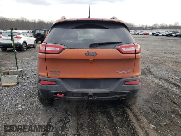 ✅ 2015 Jeep Cherokee Trailhawk • VIN: 1C4PJMBS8FW687557 • Лот: 40803933. Опубліковано раніше на Copart з пробігом 105 688 миль. Безкоштовний доступ до архіву аукціонних продажів зі США та докладний звіт про історію автомобіля на DreamBid. Зображення 6.