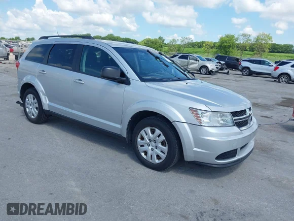 ✅ 2014 Dodge Journey American Value • VIN: 3C4PDCAB4ET141314 • Lot: 45477190. Listed on IAAI with 182,635 mi. Free auction sales archive from the USA and detailed vehicle history report at DreamBid. Image 1.