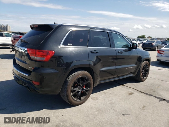 ✅ 2012 Jeep Grand Cherokee SRT-8 • VIN: 1C4RJFDJ7CC211421 • Lot: 55883505. Wystawiony na Copart z przebiegiem 96 877 mil. Bezpłatny archiwum sprzedaży aukcyjnych z USA i szczegółowy raport historii pojazdu na DreamBid. Zdjęcie 3.