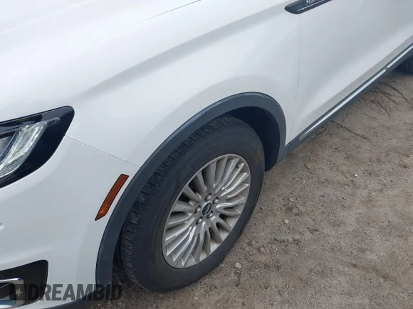 ✅ 2020 Lincoln Nautilus Standard • VIN: 2LMPJ8J9XLBL31498 • Lot: 44900154. Wystawiony na IAAI z przebiegiem 63 149 mil. Bezpłatny archiwum sprzedaży aukcyjnych z USA i szczegółowy raport historii pojazdu na DreamBid. Zdjęcie 6.
