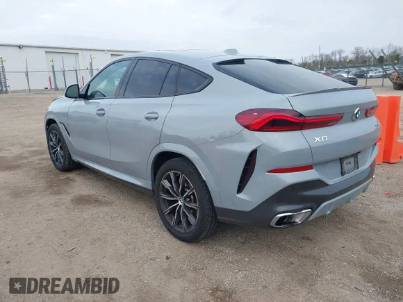 ✅ 2025 BMW X6 xDrive40i • VIN: 5UX33EX03S9Z49496 • Лот: 43661319. Опубліковано раніше на IAAI з пробігом 23 262 миль. Безкоштовний доступ до архіву аукціонних продажів зі США та докладний звіт про історію автомобіля на DreamBid. Зображення 3.