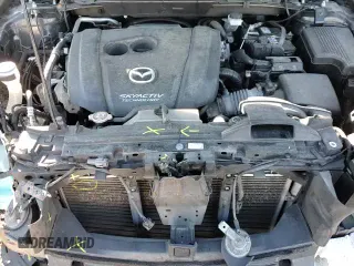 ✅ 2018 Mazda CX-5 Grand Touring • VIN: JM3KFBDM9J0431087 • Лот: 87479155. Опубликован ранее на Copart с пробегом 100 826 миль. Бесплатный доступ к архиву аукционных продаж из США и подробный отчёт об истории автомобиля на DreamBid. Изображение 15.