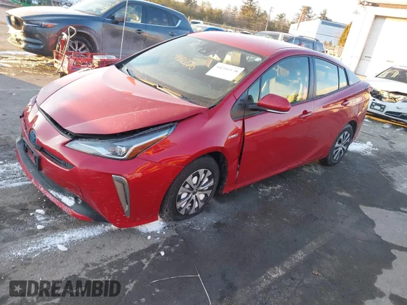 ✅ 2021 Toyota Prius LE • VIN: JTDL9MFU8M3030887 • Lot: 44251570. Wystawiony na IAAI z przebiegiem 12 003 mil. Bezpłatny archiwum sprzedaży aukcyjnych z USA i szczegółowy raport historii pojazdu na DreamBid. Zdjęcie 2.