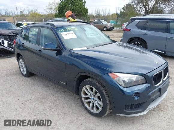 ✅ 2015 BMW X1 xDrive28i • VIN: WBAVL1C59FVY39812 • Lot: 42179854. Listed on IAAI with 185,461 mi. Free auction sales archive from the USA and detailed vehicle history report at DreamBid. Image 1.