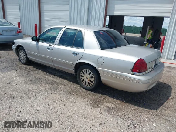 ✅ 2005 Ford Crown Victoria LX • VIN: 2FAFP74W25X130230 • Lot: 42620784. Wystawiony na IAAI z przebiegiem 173 441 mil. Bezpłatny archiwum sprzedaży aukcyjnych z USA i szczegółowy raport historii pojazdu na DreamBid. Zdjęcie 3.