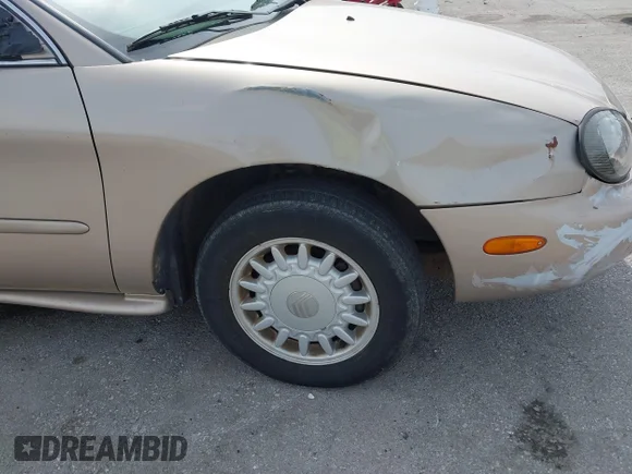 ✅ 1998 Mercury Sable GS • VIN: 1MEFM50U9WG641693 • Lot: 45191654. Listed on IAAI with 101,324 mi. Free auction sales archive from the USA and detailed vehicle history report at DreamBid. Image 6.