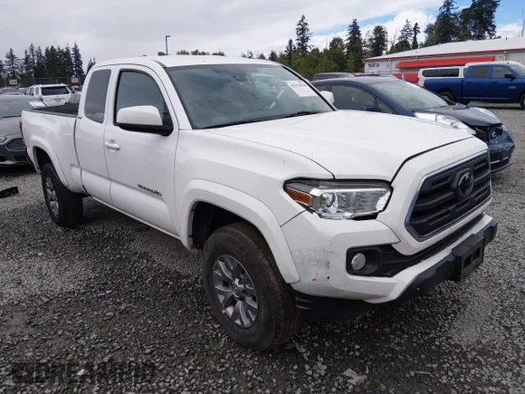 ✅ 2019 Toyota Tacoma SR • VIN: 5TFSZ5AN6KX207394 • Лот: 45474528. Опубликован ранее на IAAI с пробегом 103 276 миль. Бесплатный доступ к архиву аукционных продаж из США и подробный отчёт об истории автомобиля на DreamBid. Изображение 1.
