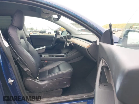 ✅ 2022 Tesla Model Y Performance • VIN: 7SAYGDEF2NF337087 • Лот: 44754403. Опубліковано раніше на IAAI з пробігом 124 498 миль. Безкоштовний доступ до архіву аукціонних продажів зі США та докладний звіт про історію автомобіля на DreamBid. Зображення 5.
