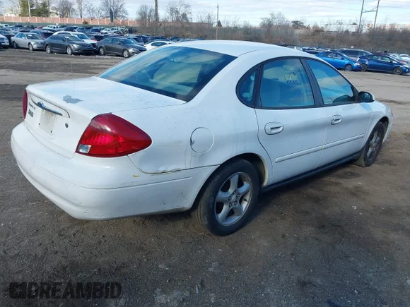 ✅ 2001 Ford Taurus SE • VIN: 1FAFP53U01G193931 • Лот: 44149317. Опубліковано раніше на IAAI з пробігом 184 802 миль. Безкоштовний доступ до архіву аукціонних продажів зі США та докладний звіт про історію автомобіля на DreamBid. Зображення 4.