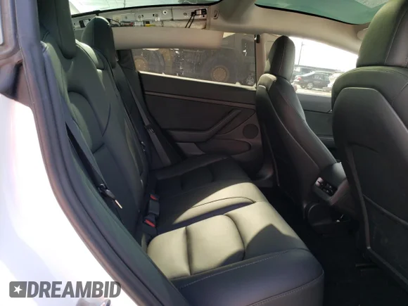 ✅ 2023 Tesla Model 3 • VIN: 5YJ3E1EA7PF385624 • Лот: 40093243. Опубліковано раніше на Copart з пробігом 4 660 миль. Безкоштовний доступ до архіву аукціонних продажів зі США та докладний звіт про історію автомобіля на DreamBid. Зображення 10.