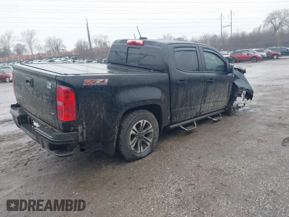 ✅ 2021 Chevrolet Colorado 4WD Z71 • VIN: 1GCGTDEN7M1156750 • Lot: 44547189. Listed on IAAI with 105,902 mi. Free auction sales archive from the USA and detailed vehicle history report at DreamBid. Image 4.