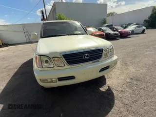 ✅ 1999 Lexus LX 470 • VIN: JT6HT00W2X0043142 • Lot: 80572235. Wystawiony na Copart z przebiegiem 255 958 mil. Bezpłatny archiwum sprzedaży aukcyjnych z USA i szczegółowy raport historii pojazdu na DreamBid. Zdjęcie 11.