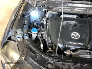 ✅ 2021 Mazda CX-5 Grand Touring • VIN: JM3KFADM4M1340575 • Лот: 72064625. Опубликован ранее на Copart с пробегом 84 470 миль. Бесплатный доступ к архиву аукционных продаж из США и подробный отчёт об истории автомобиля на DreamBid. Изображение 14.