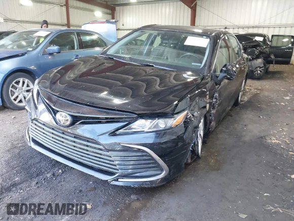 ✅ 2023 Toyota Camry LE • VIN: 4T1C11AKXPU792561 • Lot: 43637569. Listed on IAAI with 103,712 mi. Free auction sales archive from the USA and detailed vehicle history report at DreamBid. Image 2.