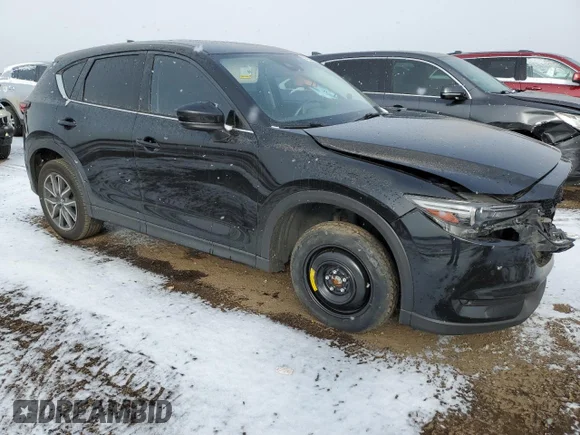 ✅ 2017 Mazda CX-5 Grand Touring • VIN: JM3KFBDL0H0131472 • Лот: 66702332. Опубліковано раніше на Copart з пробігом 63 990 миль. Безкоштовний доступ до архіву аукціонних продажів зі США та докладний звіт про історію автомобіля на DreamBid. Зображення 4.