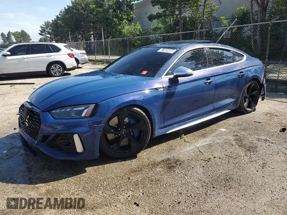 ✅ 2021 Audi RS 5 Sportback • VIN: WUAAWCF55MA901715 • Lot: 61932085. Listed on Copart with 73,647 mi. Free auction sales archive from the USA and detailed vehicle history report at DreamBid. Image 1.