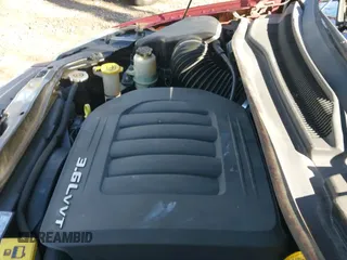 ✅ 2013 Chrysler Town & Country Touring • VIN: 2C4RC1BG7DR810977 • Lot: 43753229. Listed on IAAI with 140,694 mi. Free auction sales archive from the USA and detailed vehicle history report at DreamBid. Image 13.