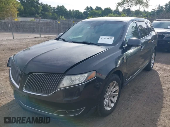 ✅ 2013 Lincoln MKT • VIN: 2LMHJ5NK8DBL58619 • Лот: 42948177. Опубликован ранее на IAAI с пробегом 519 335 миль. Бесплатный доступ к архиву аукционных продаж из США и подробный отчёт об истории автомобиля на DreamBid. Изображение 2.
