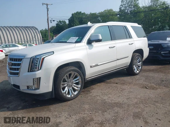 ✅ 2018 Cadillac Escalade Premium Luxury • VIN: 1GYS4CKJ0JR228284 • Лот: 42484158. Опубликован ранее на IAAI с пробегом 60 477 миль. Бесплатный доступ к архиву аукционных продаж из США и подробный отчёт об истории автомобиля на DreamBid. Изображение 2.