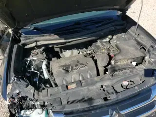 2018 Mitsubishi Outlander SE with VIN JA4AD3A38JZ034620, listed as a Copart auction lot 86805745 with 125,489 mi miles and Salvage title. Bid and sale history available at DreamBid. Image 14.