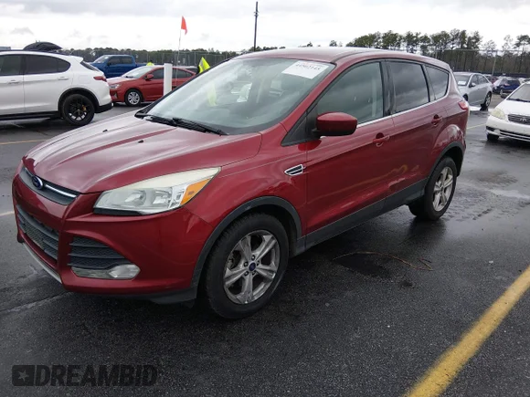 ✅ 2014 Ford Escape SE • VIN: 1FMCU0GX9EUC66911 • Lot: 44502145. Listed on IAAI with 137,454 mi. Free auction sales archive from the USA and detailed vehicle history report at DreamBid. Image 2.