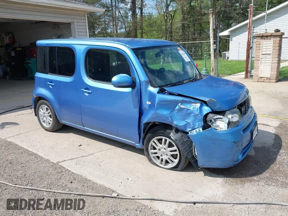 ✅ 2012 Nissan Cube S • VIN: JN8AZ2KR9CT255738 • Lot: 44919158. Listed on IAAI with 92,970 mi. Free auction sales archive from the USA and detailed vehicle history report at DreamBid. Image 1.
